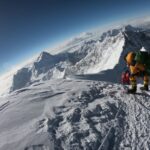 TOPSHOT - In this photo taken on May 17, 2018, mountaineers make their way to the summit of Mount Everest, as they ascend on the south face from Nepal. (Photo by Phunjo LAMA / AFP)        (Photo credit should read PHUNJO LAMA/AFP via Getty Images)